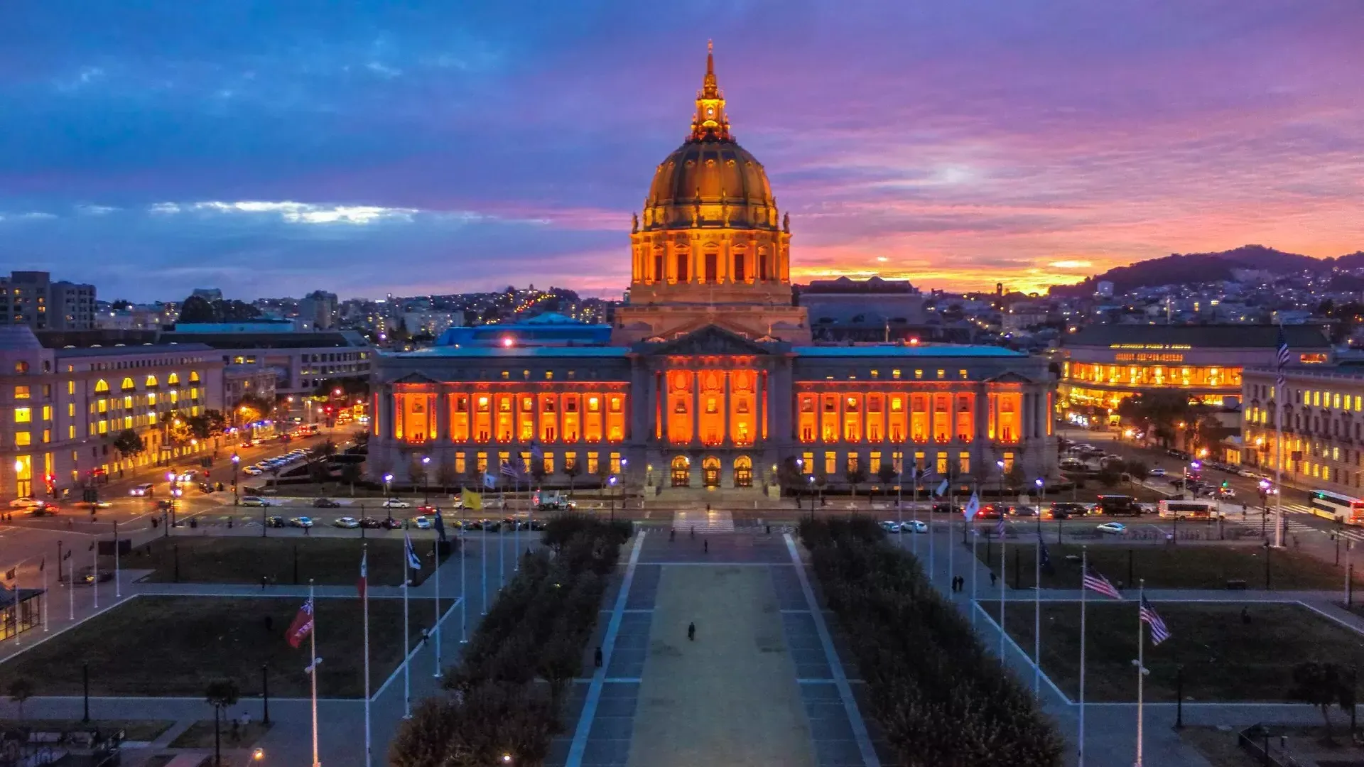 City Hall illuminated in orange light