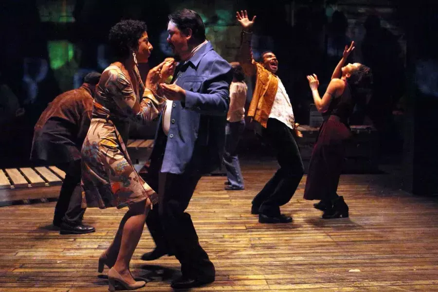 Performers in mid-20th century costume 跳舞 on stage at the Magic Theatre during a performance of "Gangster of Love."