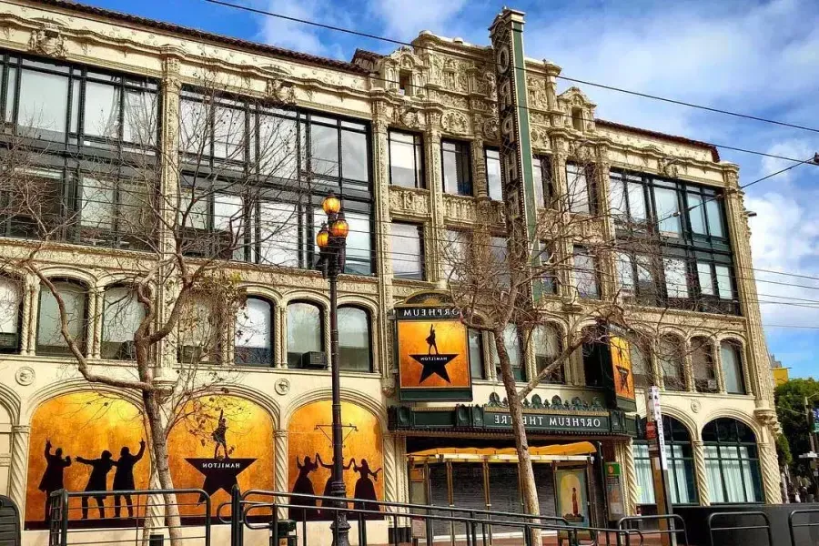 Exterior of the Orpheum Theatre, featuring promotional posters for the Broadway musical "Hamilton."