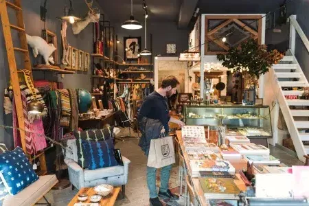 A man shops for items inside a boutique 在贝博体彩app's NoPa neighborhood.