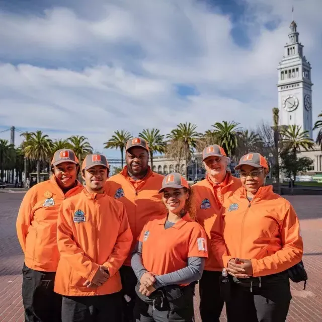 San Francisco's Welcome Ambassadors prepare to greet visitors at the Ferry Building.